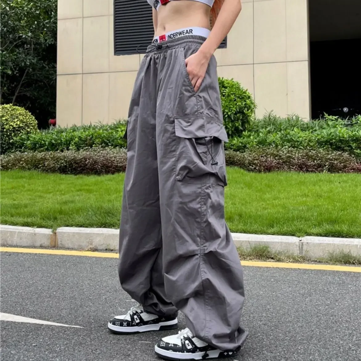 Pantalones de chándal holgados de estilo hip hop para mujer, con bolsillos grandes, cintura alta y cordón, estilo harén