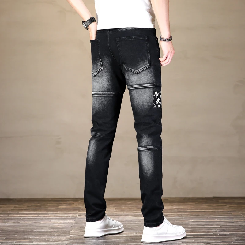 High-End Stitching Black Jeans Men's American High Street Ripped Stitching Printed Patch Slim Stretch Pencil Pants Trousers