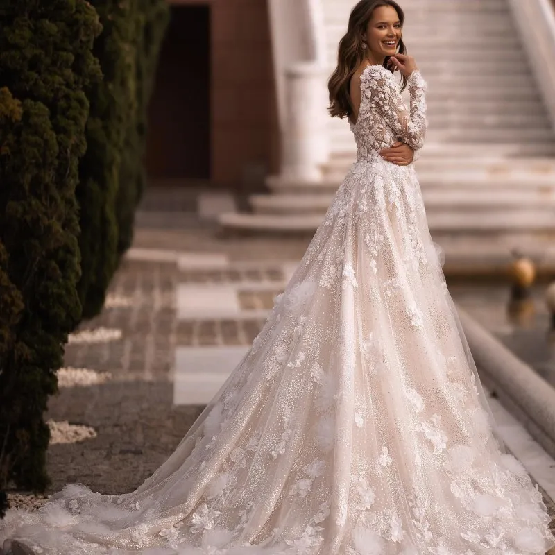 

Champagne A-Line Shiny Beach Wedding Dresses 2023 Long Sleeve Illusion Bride Dress Gorgeous Appliques Romantic Bridal Gowns
