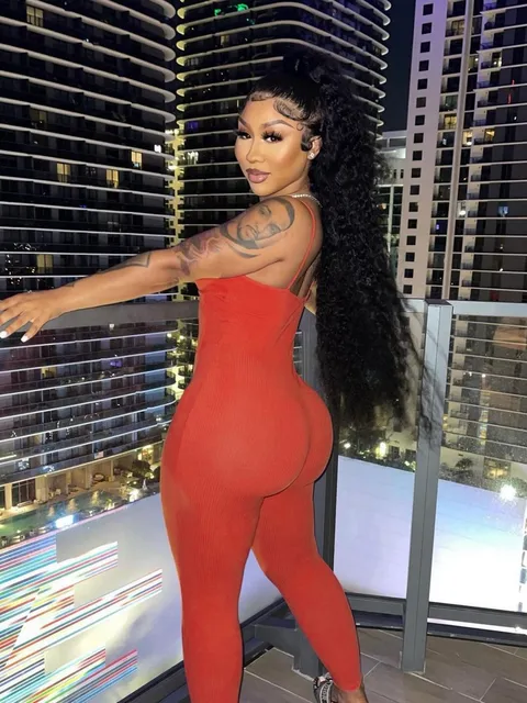 Neon Orange Fitness Romper: Sultry Style Meets Body-Sculpting Performance