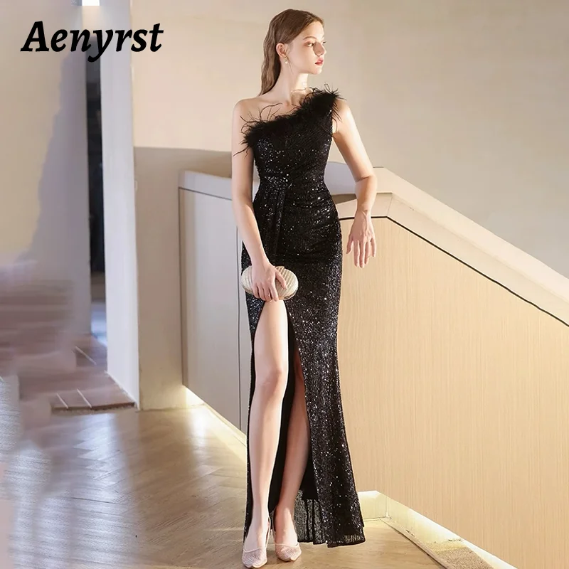 

Aenyrst Black Mermaid Prom Dress Women's One Shoulder Feather Sequin Evening Gown Side Slit Floor Length Formal Party Dresses