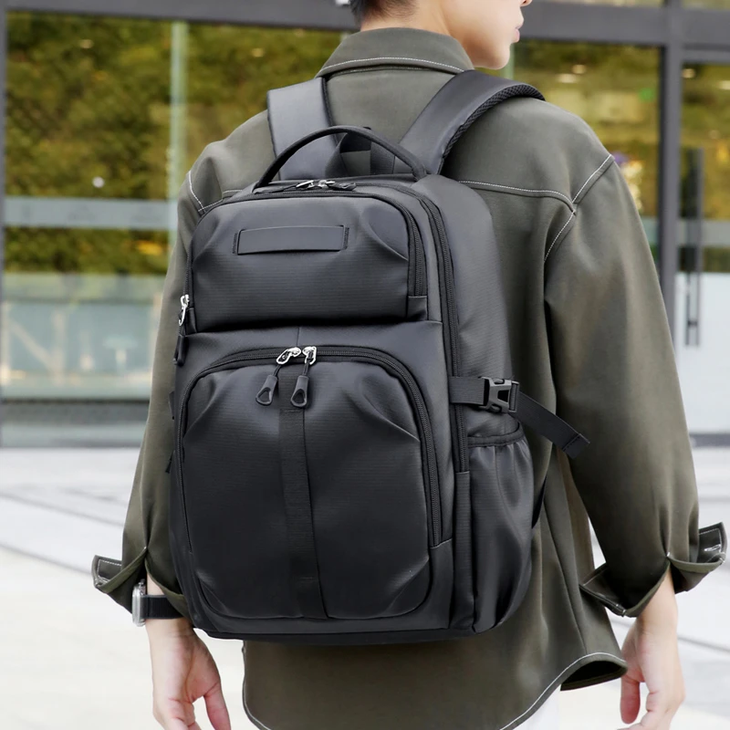 Business backpack, laptop backpack, travel bag, black, large capacity, suitable for different scenarios