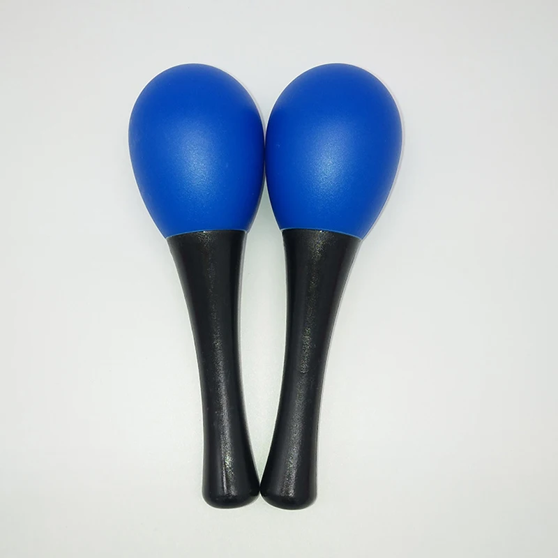 Plastic maracas Orff instrument players hold plastic maracas Toddlers Early education Children grasp egg