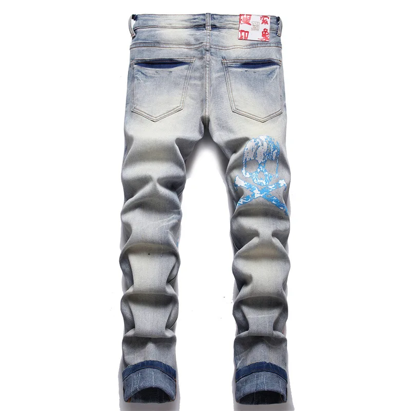 Men Skull Print Jeans Trendy Character Slogan Painted Stretch Pants Vintage Punk Button Fly Holes Ripped Slim Tapered Trousers