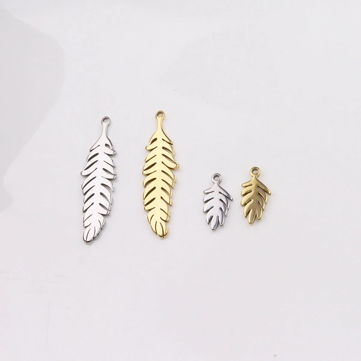 

10pcs Wholesale Stainless Steel Feather Leaf Charms Pendant Women Girl DIY Necklace Earrings Bracelets Unfading Colorless