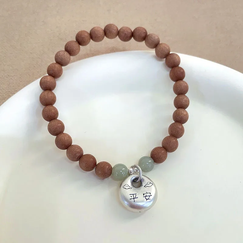 

Женский браслет из серебра 925 пробы с круглыми бусинами из сандалового дерева