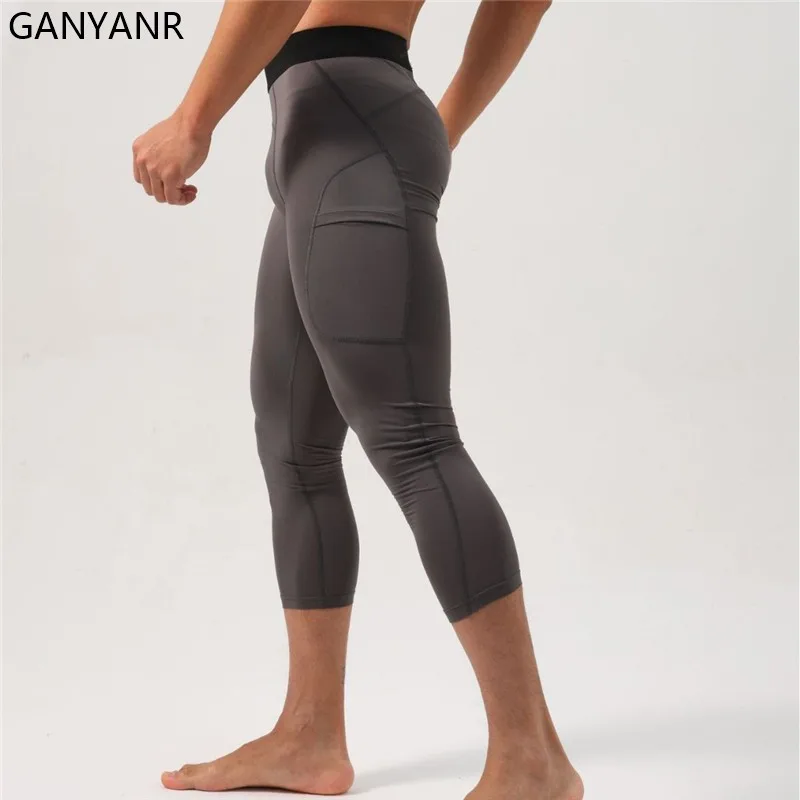 GANYANR Running Tights Men With Pockets Compression Leggings Gym Fitness Football basketball Soccer Sportswear Pants trousers