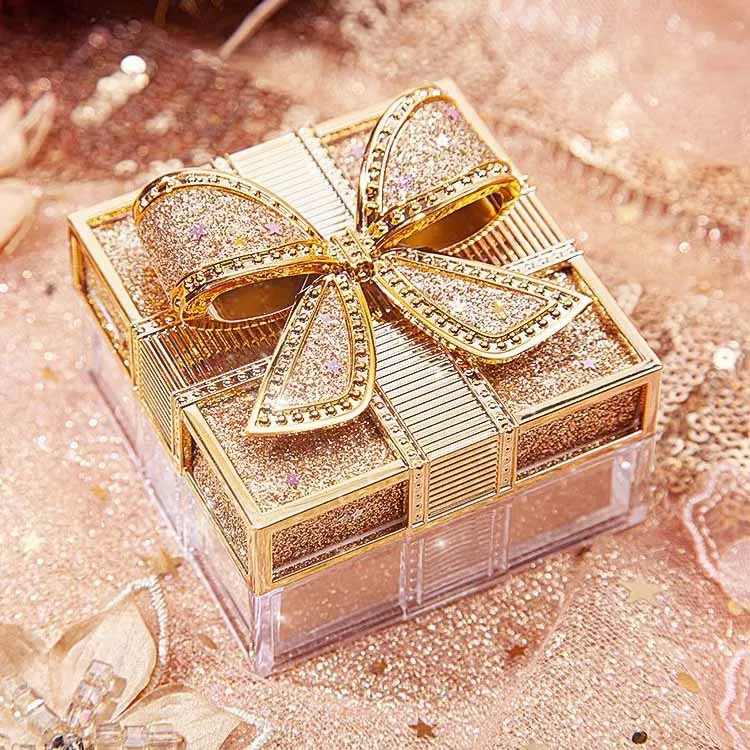 

Bow tie silk feeling air powder waterproof net red models brightening invisible pores make-up fixing loose powder