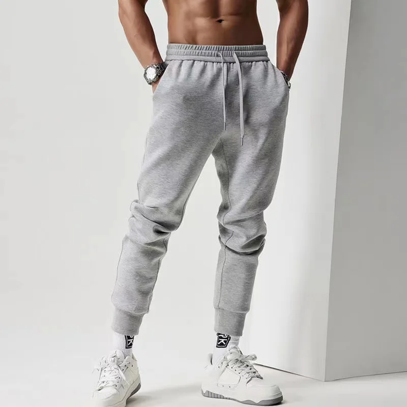 Muscle Fitness Brothers 새로운 여름 트렌드 캐주얼 스포츠 바지 야외 달리기 통기성 경량 작은 발바닥 바지