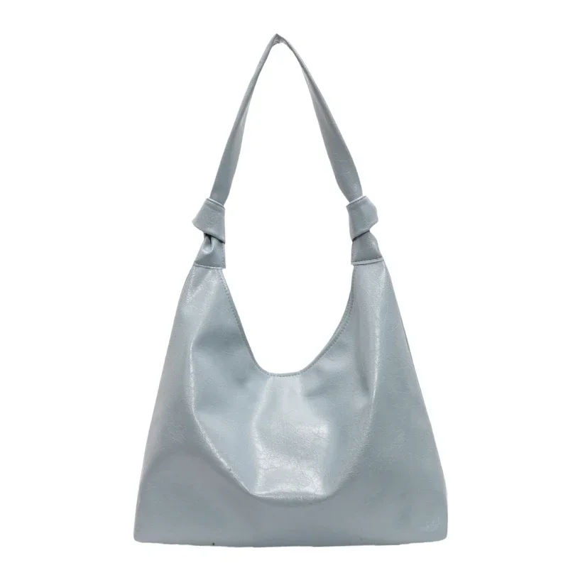 thumbnail image 1 of Bolso de hombro de PU de diseñador con broche 2024 nuevo para mujer, bolso de mano de moda simple y sólido, bolso de mano suave y versátil para desplazamientos diarios, estilo occidental, 1 of 5