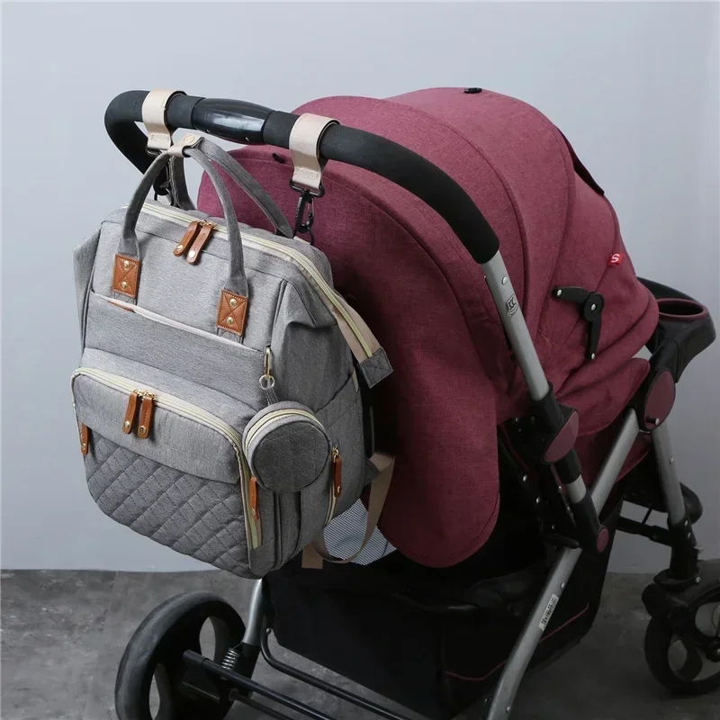 Mummy Backpack With Foldable Crib Soft Mattress Multifunctional Mommy Bags Baby Bottle Insulation Storage Bags Diaper Organizer 4