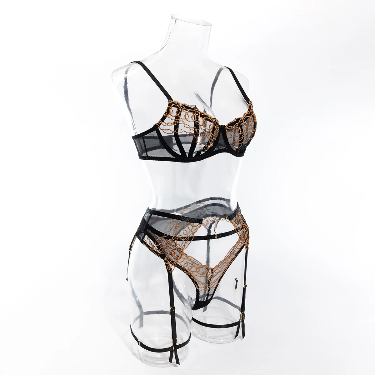 Conjunto de sujetador, tanga y liguero negro con precioso bordado marrón