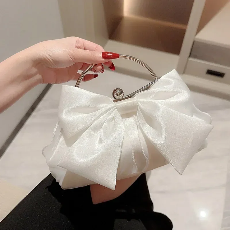 Bow Clutch (Shimmer) – Cuyana