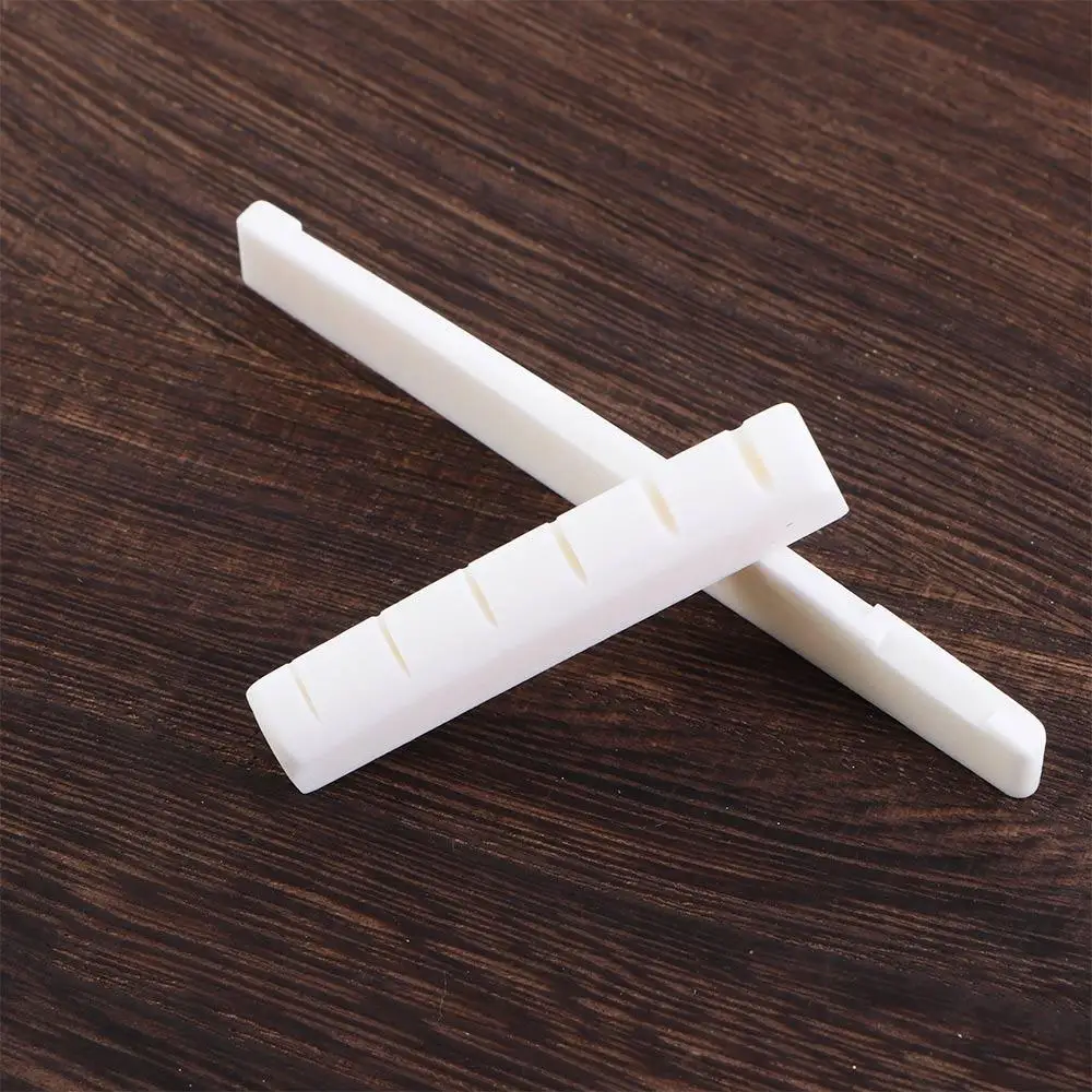 

White Durable 6 String Stringed Instruments Guitar Parts Musical Saddle and Nut Bone Bridge Guitar Bridge Acoustic Guitar