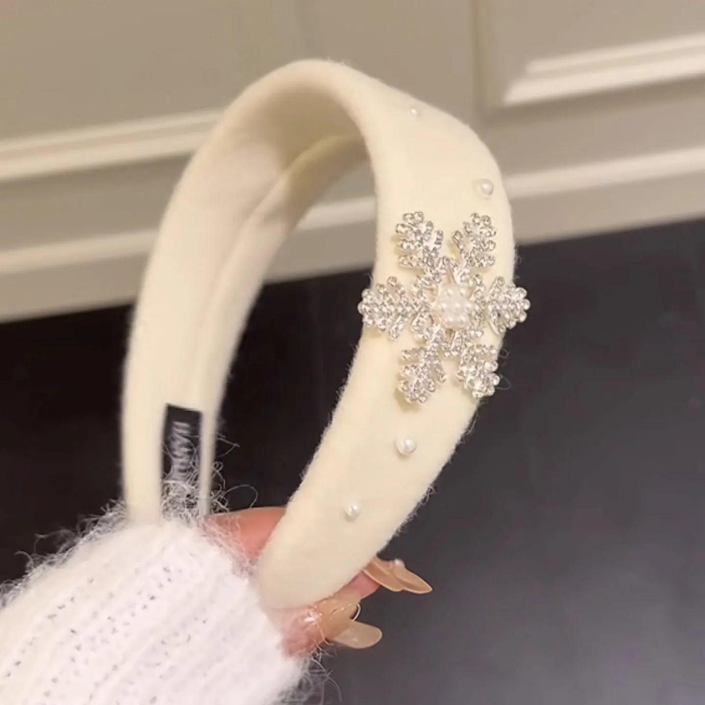 White snowflake plush headband