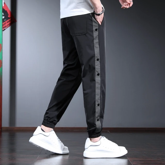 Nike Tear-Away Pants Side Buttons Snap Pants, Men's Fashion, Bottoms,  Joggers on Carousell