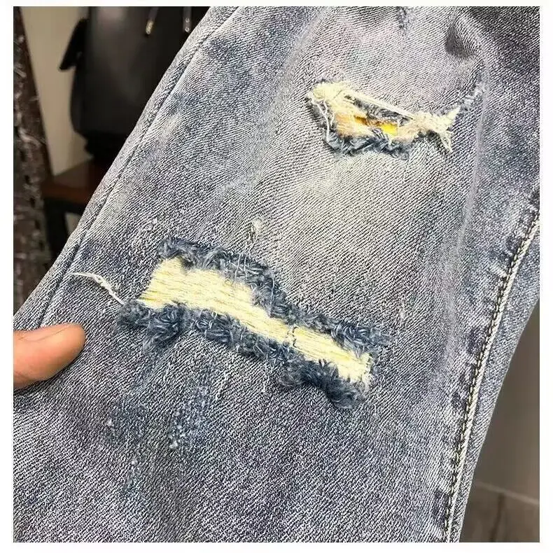 Fashion men's casual jeans vintage spring and autumn slim ripped jean pants with HOLE design men clothing luxury cargo pants