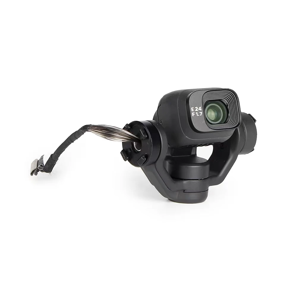 Amortisseurs en caoutchouc pour DJI Mini 3 Pro, quatre pièces noires sur fond gris.