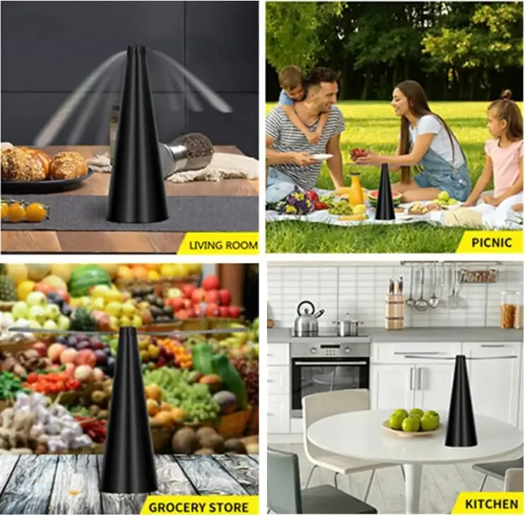 Masada içeceklerin yanında duran taşınabilir sinek vantilatörü