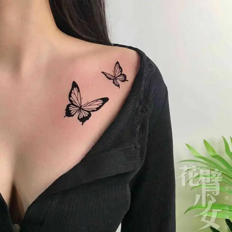 Butterfly tattoo on chest black white  giahi  Chest tattoos for women  Tattoos for women Butterfly tattoo