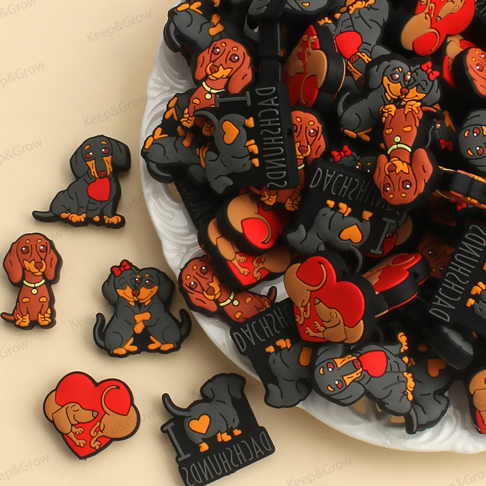 Assorted cute dachshund dog and heart-shaped silicone focal beads for DIY pen making and jewelry crafts.
