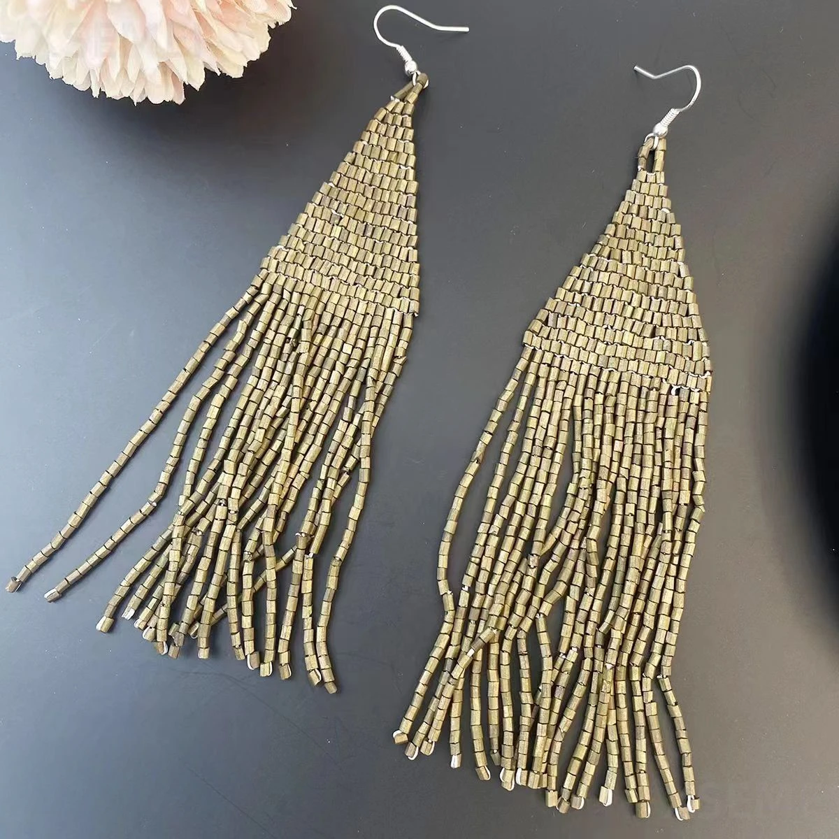 S239a0cc14bab432885791fadcc8b59dcZ Fashionable Retro Style Hand Woven Ethnic Style Solid Color Long Style Exaggerated Tassel Earrings Suitable High-End Women Mallzona