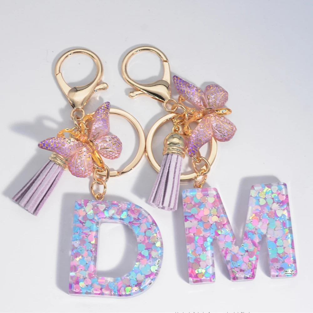 

Брелок для ключей женский с блестками и надписью