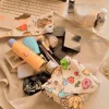 2024 New Fantastic Folding Cosmetic Bag Magic Cloth Hundred Patch Cloth Camera For iPad Storage Bag 1
