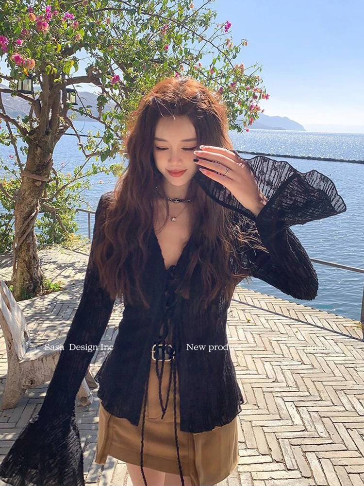 

Zoki Sexy See Through Women Blouse Korean Hollow Out Sun Proof Tops Beach Flare Sleeve Female Slim Solid Lace Up Casual Shirt
