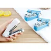 Home handheld portable mini manual sewing machine handheld pocket outdoor travel small sewing machine 3