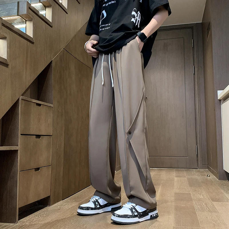 Fashion Solid Color Spliced Lace Up Casual Pants Men's Clothing 2024 Spring Summer New Loose All-match Elastic High Waist Pants
