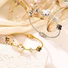 A Fashionable Jewelry Cross-border four-leaf flower original stainless steel wire rope bracelet magnetic suction bracelet fashio 2
