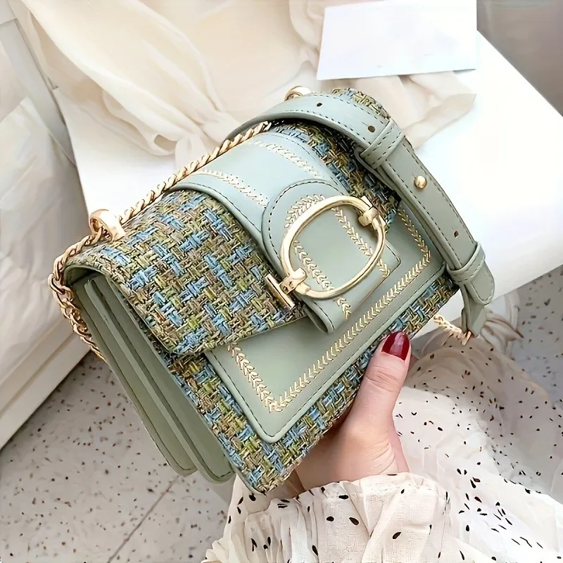 Elegant small crossbody bag made of tweed with an adjustable strap, modern buckle closure - available in cream, green, blue, and black.
