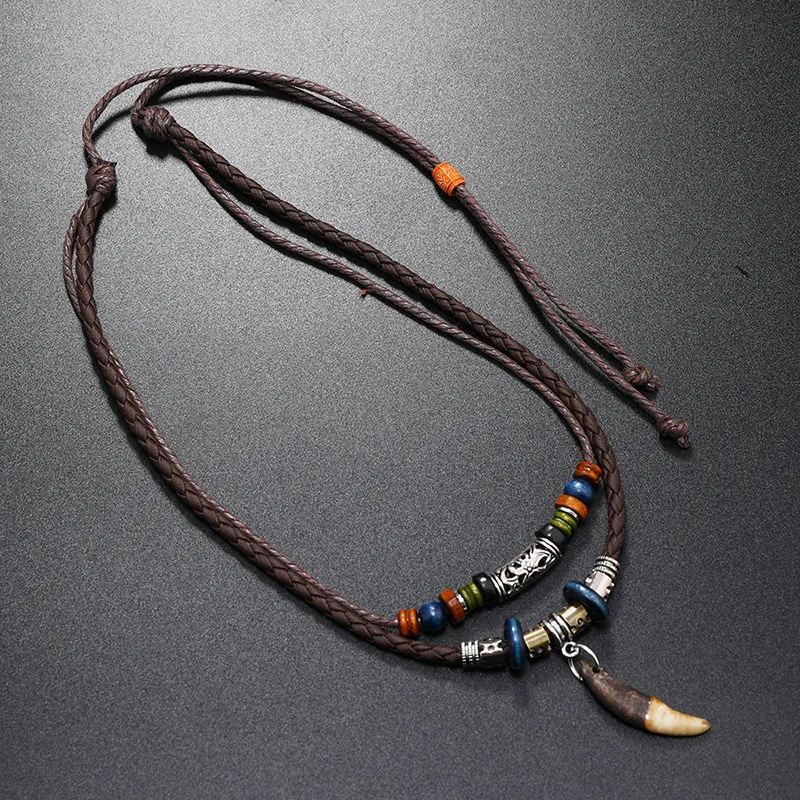LETAPI Punk Vintage Wolf Tooth Pendant Necklace for Men Women Leather Beaded Weaved Ethnic Style Jewelry Gifts Fang Tooth Necklace