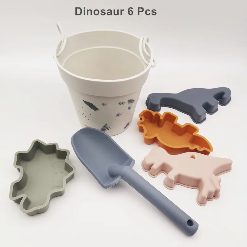 Set di giochi da spiaggia in silicone per bambini con secchiello_voghion.com