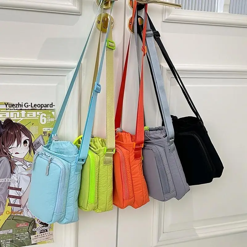 Lightweight Nylon Sling Bag with Adjustable Strap and Zipper Pocket