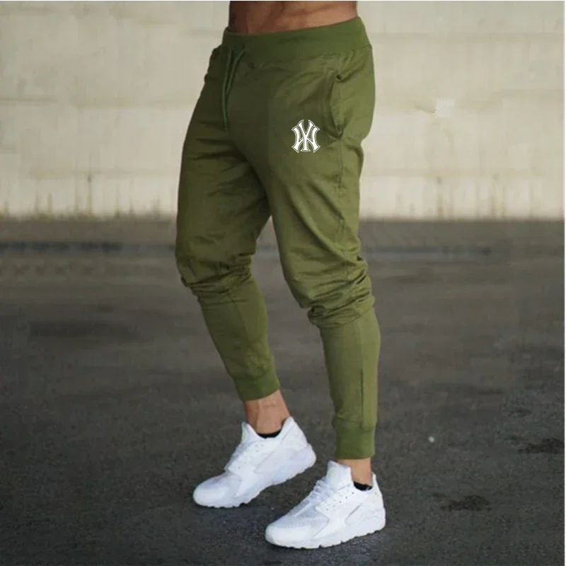 Muž kalhot léto ležérní kalhoty nový v muži šatstvo fitness sport jogging tracksuits tepláky harajuku pouliční oblečení hubený kalhot