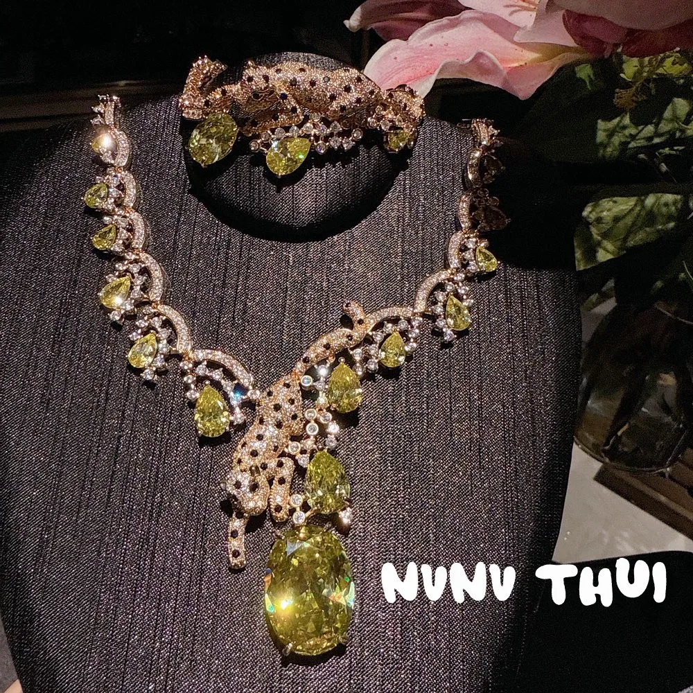 المرأة خمر الفهد الزركون الأحجار الكريمة الأصفر فل...