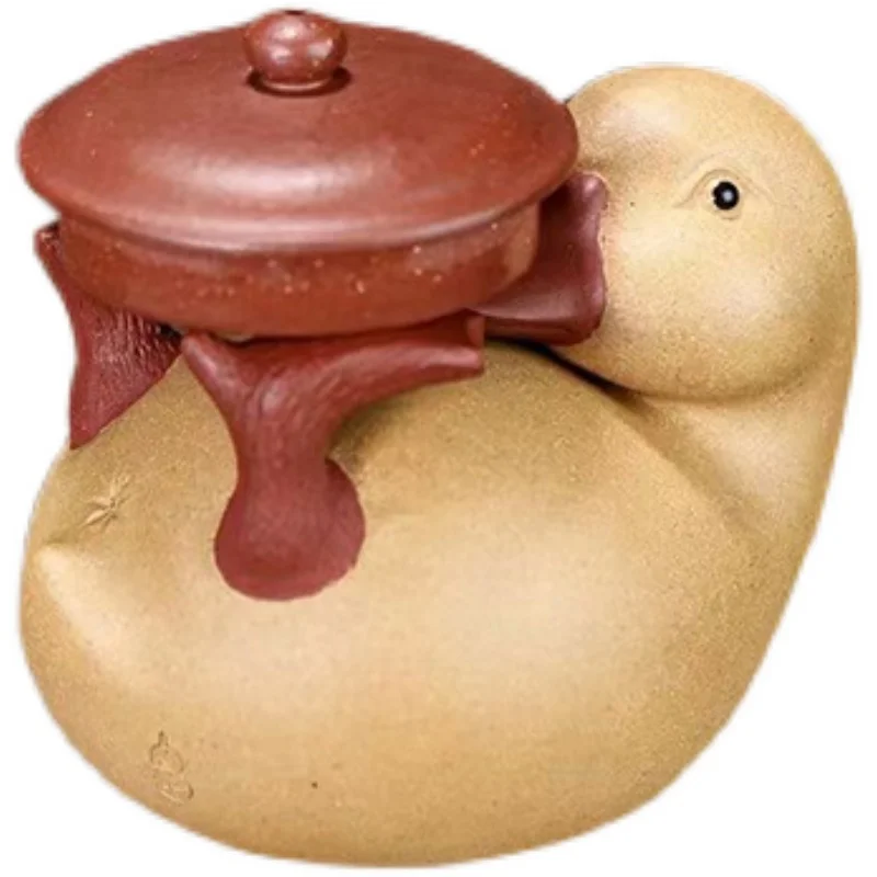 

small yellow duck tea, plays with tea, drains the shelf, covers the small pot and holds the Japanese tea ceremony spare parts.