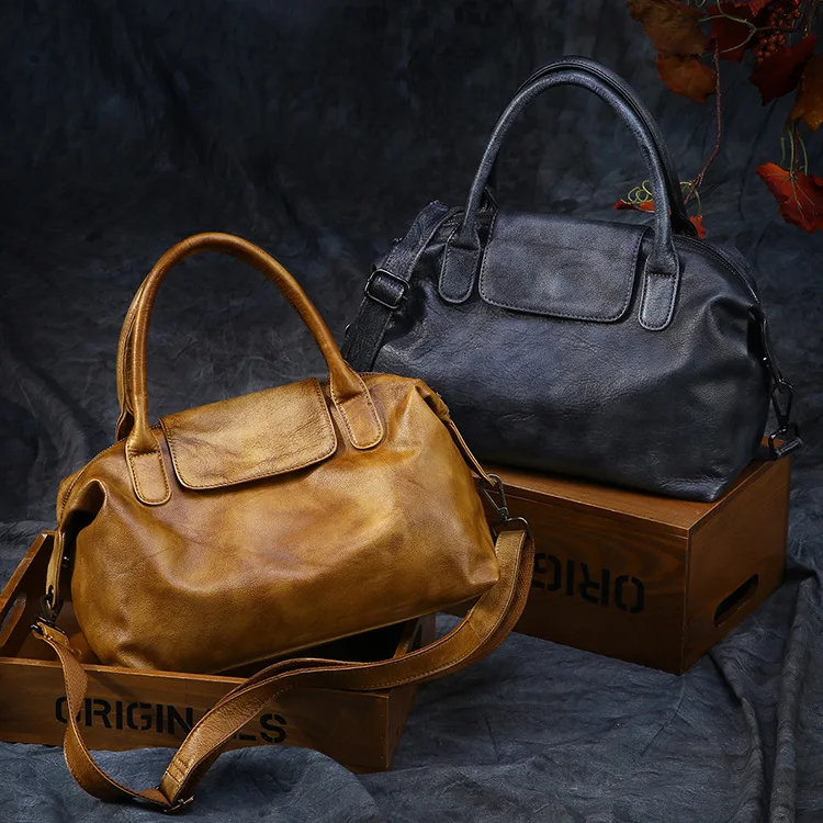 

Handmade retro cowhide top layer women's bag with one shoulder diagonal cross bag