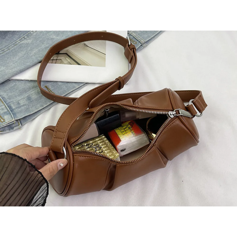 Korean version simple cylindrical women's 2024 new niche pillow versatile casual shoulder crossbody bag_voghion.com
