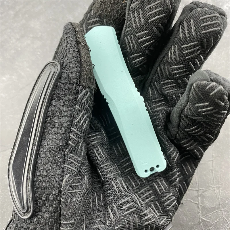 Compact Multifunctional Survival Knife for Outdoor Adventures