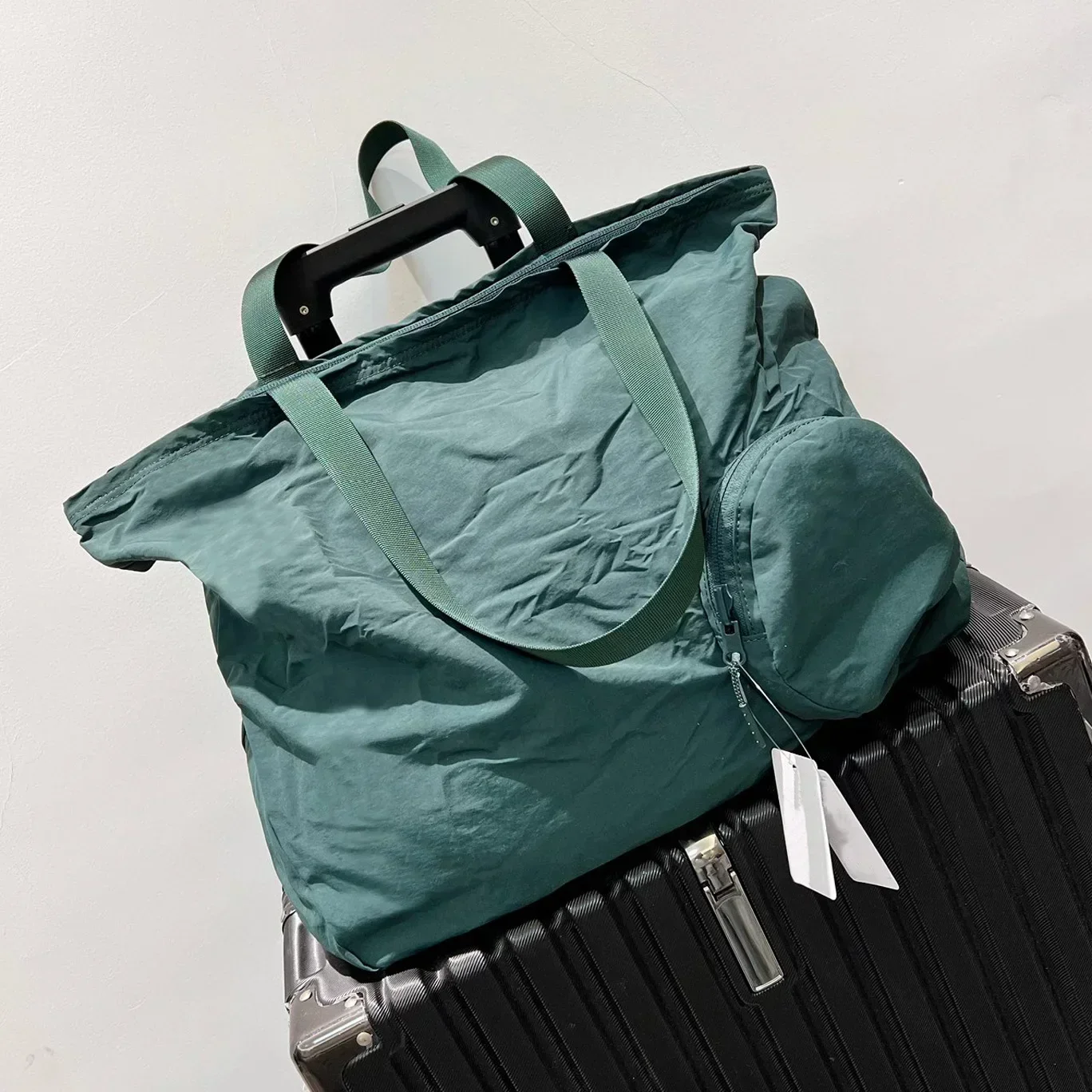 Рисунок 4 - LuluLogo 30L дорожные сумки через плечо
