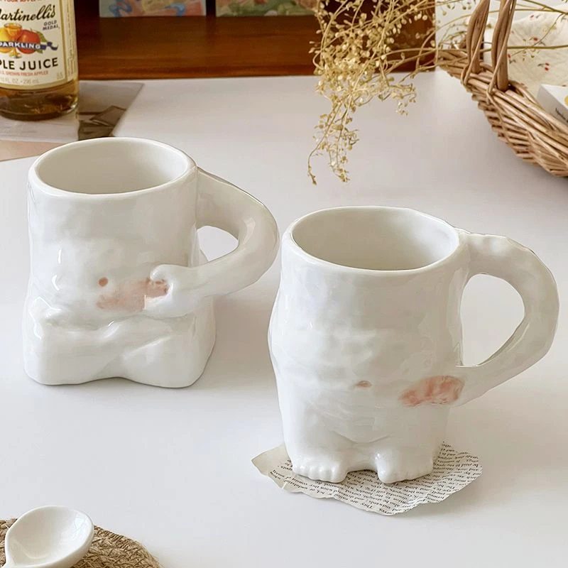 https://ae01.alicdn.com/kf/S2404cc5790ce488eb0159c24b9d449e4P/Funny-Ceramic-Mugs-Coffee-Cups-Personality-Coffee-Cup-Milk-Tea-Water-Cups-Creative-Pinch-Belly-Cup.jpg
