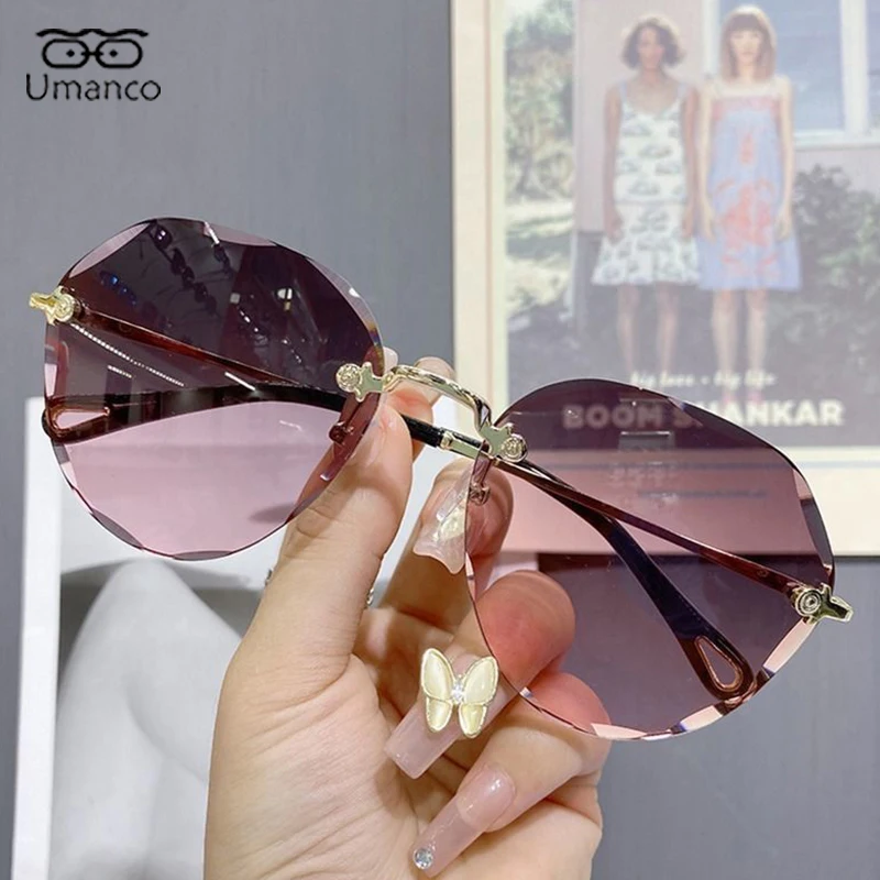 

Umanco Fashion Rimless Gradient Sunglasses for Women Oval Oversized Sun Glasses Ocean Lens Anti UV400 Design Eyeglasses Shades