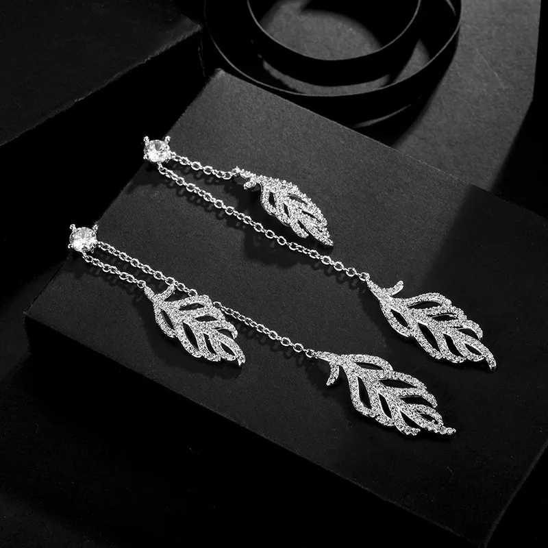 

New Earrings Crystal from Austrian Wholesale New fashion inlaid zircon leaves tassel earrings female Fit Women For Wedding