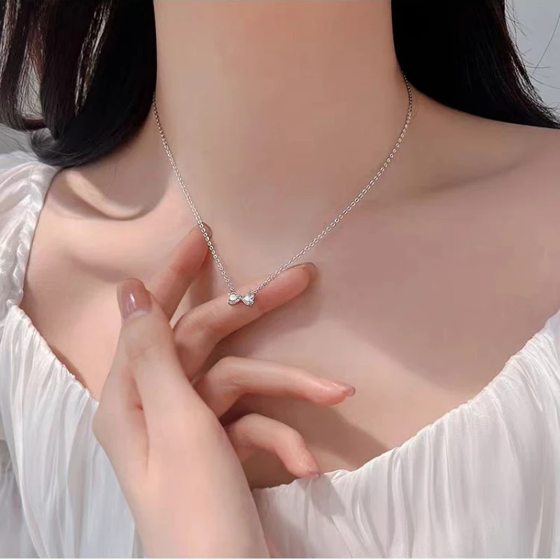 Elegant Love Chain Necklace for Women, featuring a delicate design with a charming pendant, perfect for adding a romantic touch to any outfit. Ideal for special occasions or everyday wear