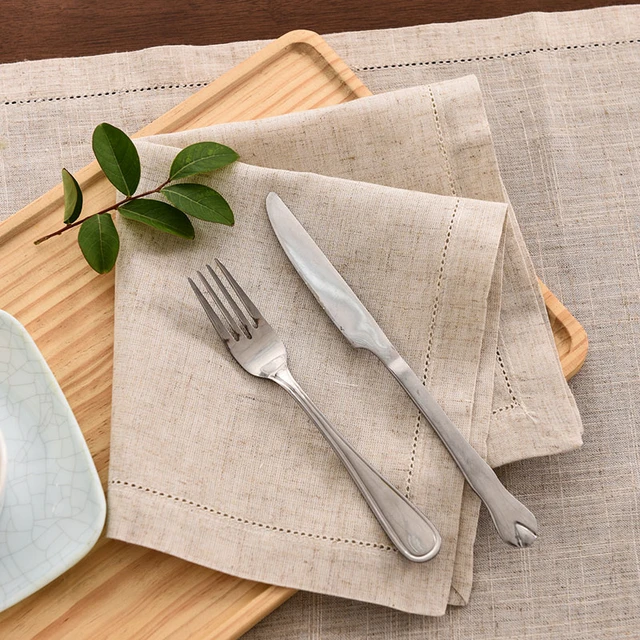 Natural linen napkins with mitered corners