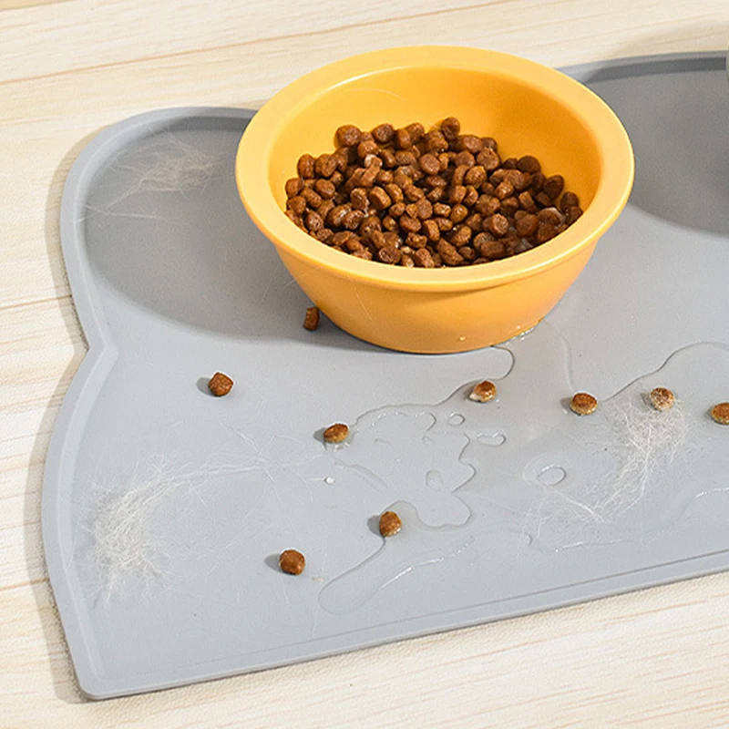 https://ae01.alicdn.com/kf/S2429784169d840808fe42423372f1f7bQ/Waterproof-Pet-Mat-For-Dog-Cat-Portable-Silicone-Pet-Food-Feeding-Pad-Leak-Proof-Non-Slip.jpg