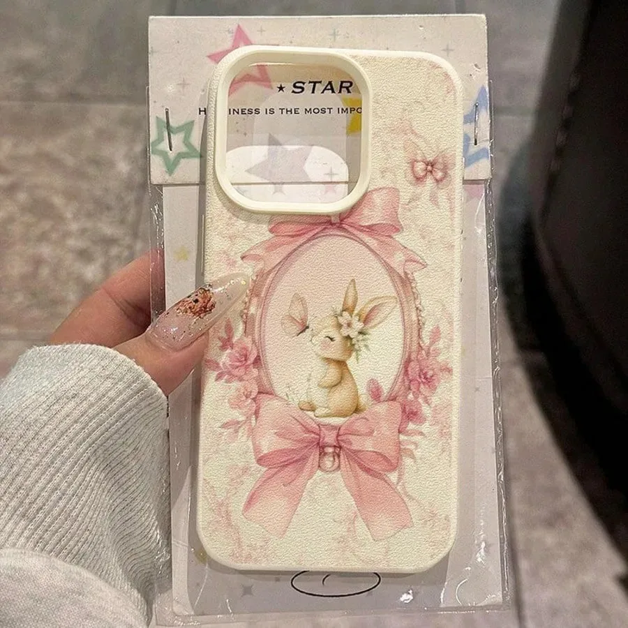 รูปสินค้า เคสโทรศัพท์ TPU ลายกระต่ายโบว์ชมพูหวาน ปกป้อง iPhone ได้ทุกรุ่น